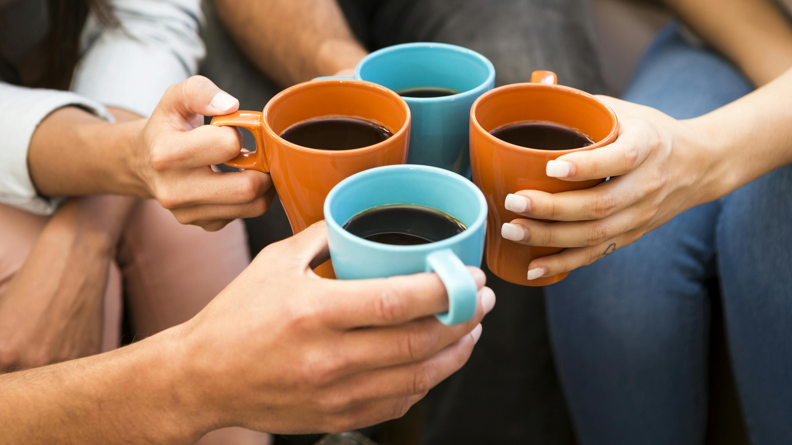 4 friends drinking coffee