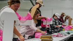 Aramark supports Breast Cancer Awareness Month with kit-packing efforts at multiple locations